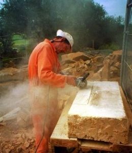 Mason cutting stonework at Heage Tower Mill