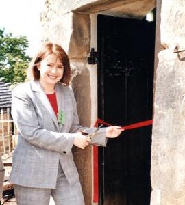 Kathy Rochford cuts tape to formally open Heage Tower Mill