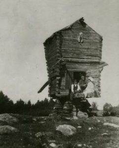 Toe mill in Pyhäranta with people sat at the entrance