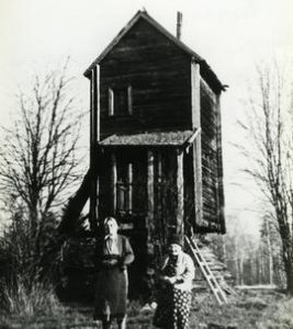 Toe mill in Karttula, Savo, with two women in front