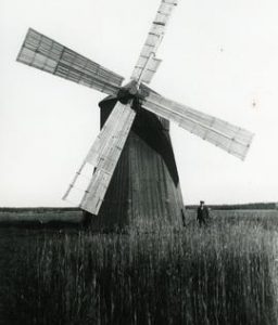 Mamsel mill with a man beneath the sails in Huittinen, Satakunta