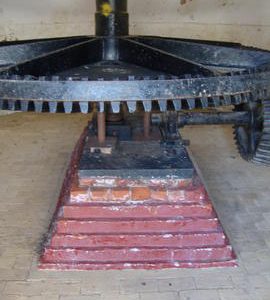 Crown wheel, pit wheel and upright shaft support plinth, Stracey Arms Mill, Tunstall