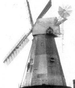 Painting mill from a ladder