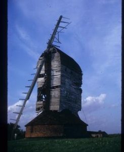 Post mill, Moreton, derelict, with two sails
