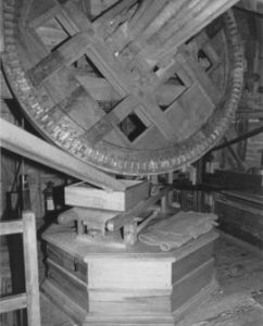 Interior showing encased mill stone and brake wheel, Jill Mill, Clayton