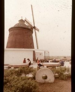 Large preserved tower mill with sails Eastern Europe