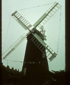 Ovenden's Mill, Polegate, preserved with sails decorated with flags