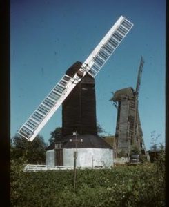 Outwood Post Mill, Outwood, preserved with two sails and derelict smock mill, also with two sails