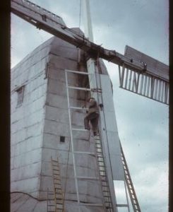 Man working on new sail that has just been fitted, New Mill, Cross in Hand