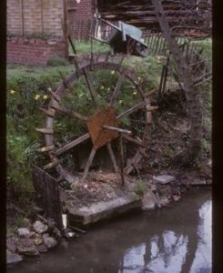 Control wheel for sluice gear(?) beside river