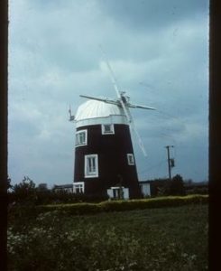 House conversion with cap and stocks, tower mill, Little Wilbraham