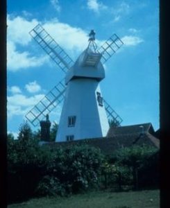 House-converted smock mill with dummy sails