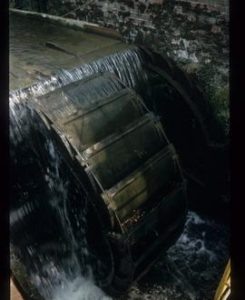 Part of exterior of preserved watermill building