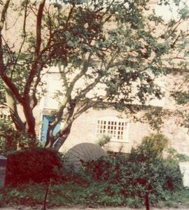 Millstone at side of mill, Westwell Mill, Westwell