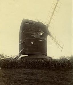 Post mill, Keston, showing hole in weatherboarding