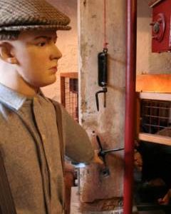 Bishop's Lydeard Mill - tentering control and turn buckle above for grain feed