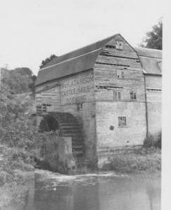 Castle Mill, Dorking, wheel and tail race, sign "W&H Atkins"
