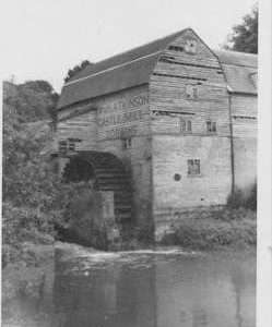 Castle Mill, Dorking, wheel and tail race, sign "W&H Atkins"