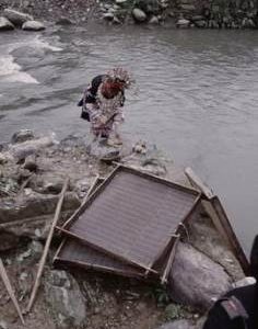 China - Liping Dimen - Moulds by river.