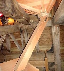 Rear of stone floor showing spout to tailstones, Lowfield Heath Mill, Charlwood