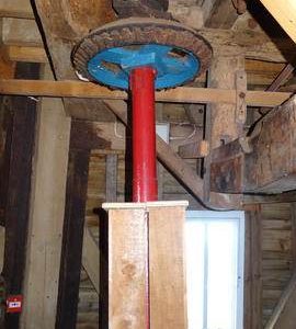 Spout floor: secondary upright shaft and bevel gear, smock mill, Herne