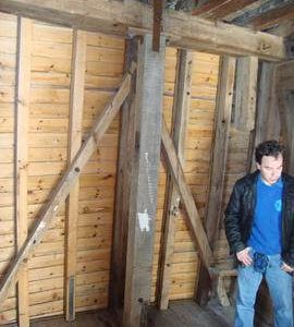 Spout floor breast framing; mill enthusiast Neil Everitt on right of photo, post mill, Holton St Pet