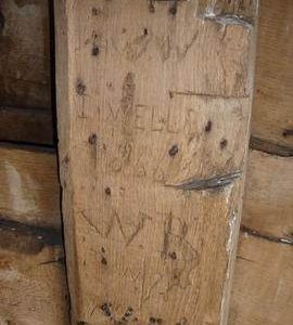 Carved inscription on timber on spout floor, post mill, Kibworth Harcourt