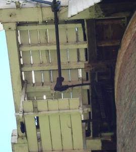 Looking up at fanstage, striking and winding gear, tower mill, Old Buckenham