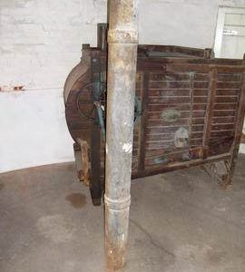 Cast-iron ceiling support column on ground floor, tower mill, Old Buckenham