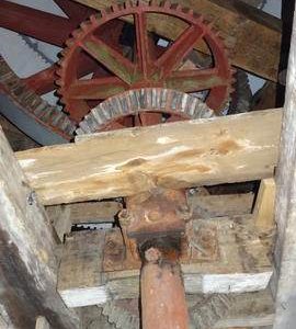 Brakewheel, wallower, upright shaft and geared sack hoist drive, tower mill, Quainton