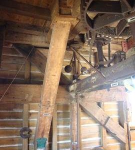 Tail great spur wheel, stone nut, governor and spout, post mill, Ramsey