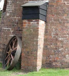 Exterior of roundhouse showing protrusion of pier through wall, Danzey Green Mill, Avoncroft Museum