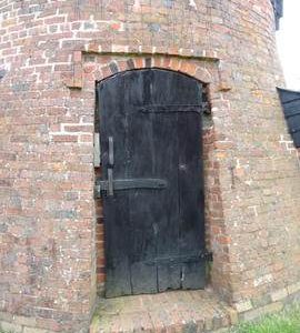 Exterior of roundhouse showing door, Danzey Green Mill, Avoncroft Museum