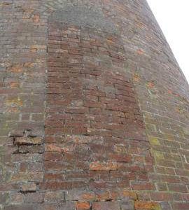 Bricked-up former entry door, tower mill, Stock