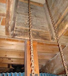 Sack trap housing and chains, tower mill, Waltham