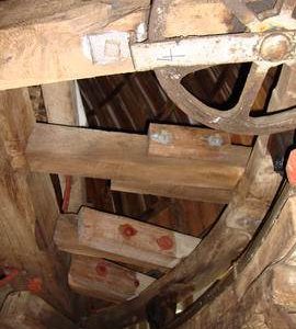 Cap frame, truck wheels, rollers and curb, Cattell's smock mill, Willingham