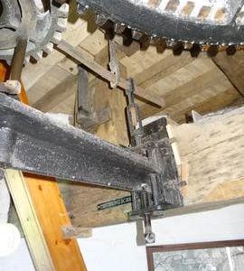 Great spur wheel, stone nut, bridgetree and steelyard links, tower mill, Wilton