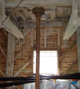 Engine drive upright shaft (and note unusual diagonal framing in background), smock mill, West Kings