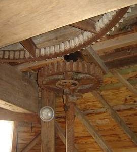 Great spur wheel and engine drive(2) nut, with screws for adjustment, smock mill, West Kingsdown, Ke