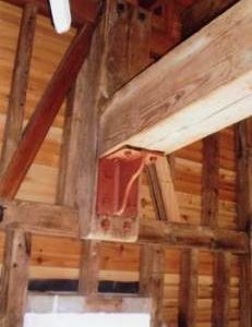 Bin support timber (not part of upright shaft/tentering gear support frame) on stone floor, with rei