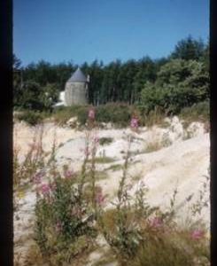 Capless tower mill with conical roof, converted to house, Edgehead, Scotland