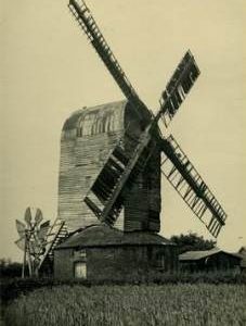 Post mill, Aythorpe Roding, with tatty sails