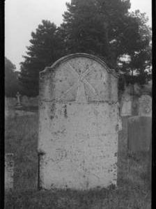 Churchyard at Denver showing headstone with mill inscription