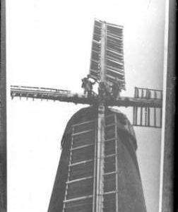 Millwrights working on sails, tower mill, Elston