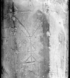 Carving of a windmill motif